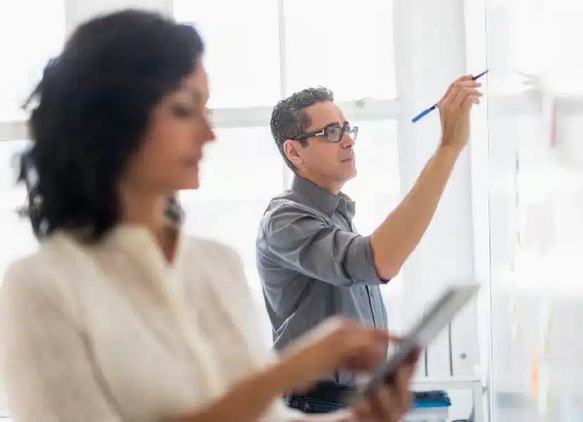 man at whiteboard